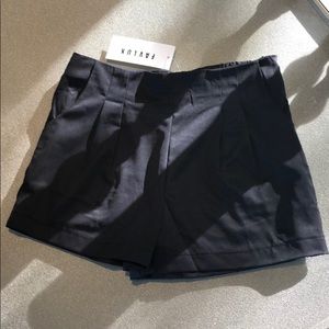 Mini black shorts w pockets. NWT